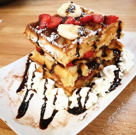 waffle with mountain of cream at the center